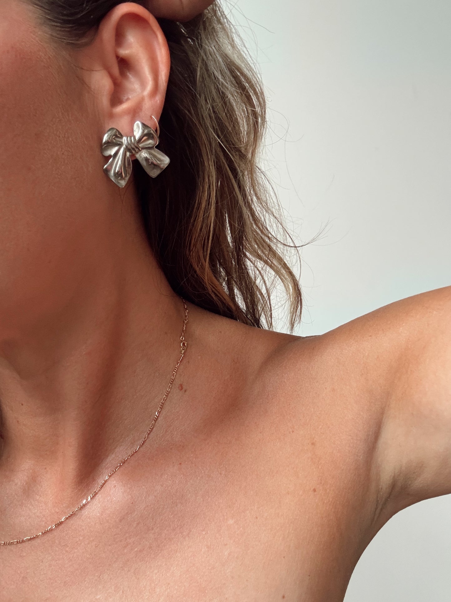 Silver Tone Bow Earrings