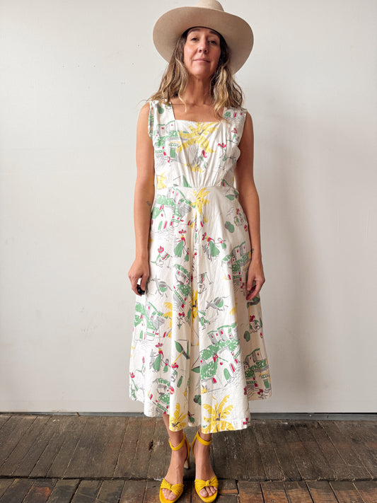 Woman wearing a floral dress and wide-brimmed hat against a plain background