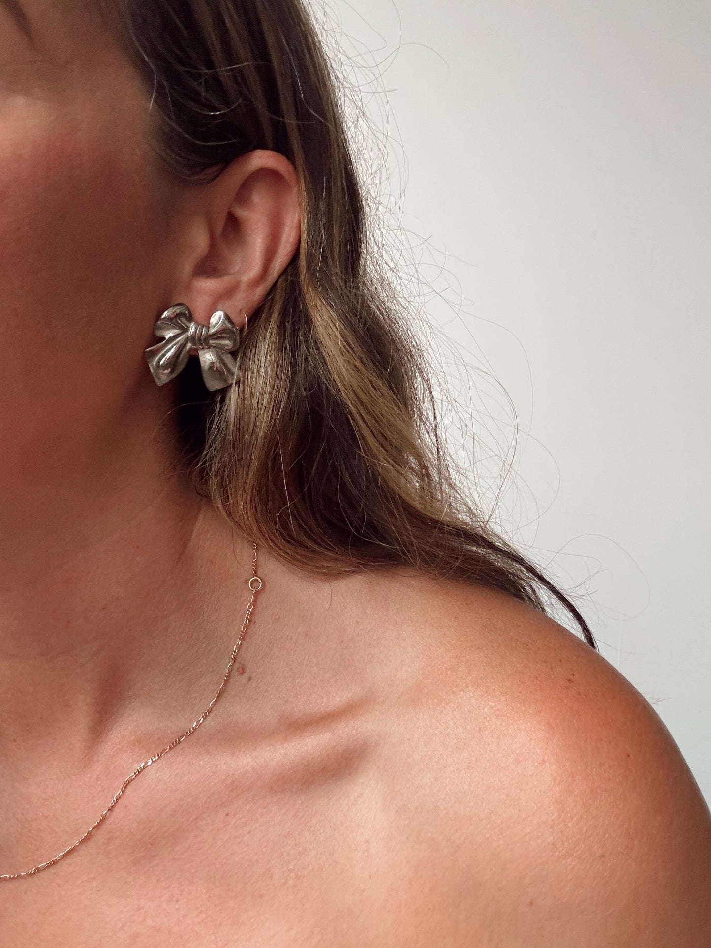 Silver Tone Bow Earrings